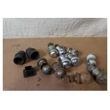 Collection of Trailer Hitch Balls and Covers