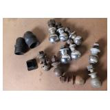 Collection of Trailer Hitch Balls and Covers