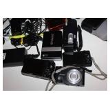 Mixed Lot of Digital Cameras, Polaroid Printer, Accessories, and Cables