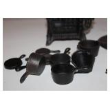Vintage Cast Iron Toy Queen Stove with Miniature Cookware Set