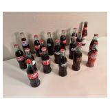 Collection of 18 Vintage Glass Soda Bottles: Coca-Cola, Pepsi & Others