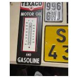 Collection of Vintage Metal Signs and License Plates