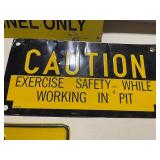 Collection of Vintage Metal Signs and License Plates