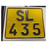 Collection of Vintage Metal Signs and License Plates