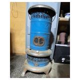 Vintage Blue Metal Parlor Stove with Ornate Detailing