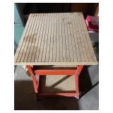 Work Table with Grooved Top and Orange Metal Frame