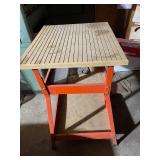 Work Table with Grooved Top and Orange Metal Frame