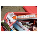 Assorted Painting Tools and Brushes in Red Storage Bin