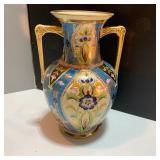 Start a collection with Van Briggle, Fenton, Nippon, and matching crystal.
