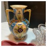 Start a collection with Van Briggle, Fenton, Nippon, and matching crystal.