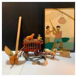 Whimsical Pinata Artwork, Cast Iron Circus Truck, and toys.