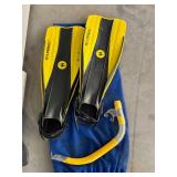 Two Medium Wet Suits, fins and snorkle.