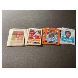 Collection of Sports Trading Cards Featuring Football and Hockey Players