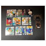 Collection of Sports Trading Cards featuring Tiger Woods and Various Athletes