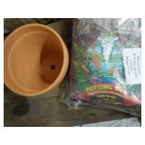 Potting Soil and Planter...