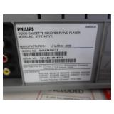 NIB PHILIPS DVD / VHS & SANYO TV W/ REMOTE.