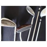 SET OF GOLF CLUBS
