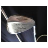 SET OF GOLF CLUBS