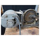 POWER HACK SAW ON HEAVY DUTY WOOD BENCH.