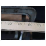 POWER HACK SAW ON HEAVY DUTY WOOD BENCH.