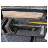 POWER HACK SAW ON HEAVY DUTY WOOD BENCH.