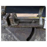POWER HACK SAW ON HEAVY DUTY WOOD BENCH.