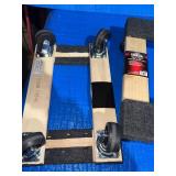 Two brand new carpeted mover dollys