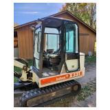 Bobcat X331 Compact Excavator with 2 buckets and thumb attachment