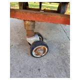 Heavy-Duty Industrial Cart with Casters and Scrap Metal Parts
