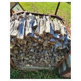 Stack of Seasoned Firewood for Heating or Outdoor Use