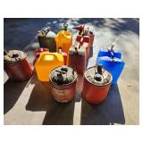 Collection of Assorted Metal and Plastic Fuel Cans and Containers