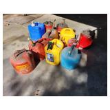 Collection of Assorted Metal and Plastic Fuel Cans and Containers