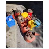Collection of Assorted Metal and Plastic Fuel Cans and Containers