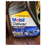Automotive Fluids Lot: CAT DEO-ULS 10W-30 Oil, Mobil Delvac 1300 Super 15W-40, NAPA ATF, Gold Oil Filter