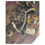 Collection of Vintage Small Engines and Mechanical Parts