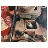 Collection of Vintage Small Engines and Mechanical Parts
