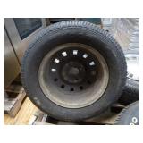 4 StarFire SX 5000 Tires on Rims with Ford Hub Caps