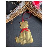 Star-Shaped Holiday Wreath with Pinecones, Ribbon, and Brass Bear Ornament