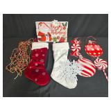 Holiday Decor Lot with Christmas Stockings, Ornaments, Garland, and Santa Sign