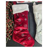 Holiday Decor Lot with Christmas Stockings, Ornaments, Garland, and Santa Sign