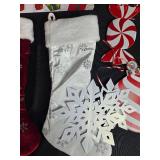 Holiday Decor Lot with Christmas Stockings, Ornaments, Garland, and Santa Sign