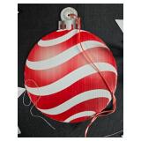 Assorted Holiday Decor Trees, Snowflake Ornaments, and Candy Signs