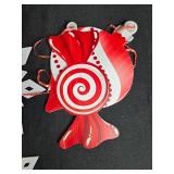 Assorted Holiday Decor Trees, Snowflake Ornaments, and Candy Signs