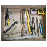 Collection of Hand Tools including Wrenches, Pliers, Tape Measures, and Saws