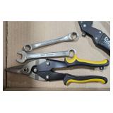 Collection of Hand Tools including Wrenches, Pliers, Tape Measures, and Saws