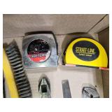 Collection of Hand Tools including Wrenches, Pliers, Tape Measures, and Saws