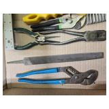 Collection of Hand Tools including Wrenches, Pliers, Tape Measures, and Saws