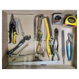 Collection of Hand Tools including Wrenches, Pliers, Tape Measures, and Saws