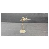 Collection of Miniature Violin Figurines and Gift Bag