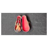 Collection of Miniature Violin Figurines and Gift Bag